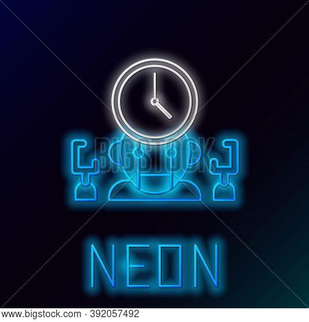 Glowing Neon Line Robot And Digital Time Manager Icon Isolated On Black Background. Time Management 