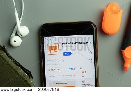 New York, Usa - 26 October 2020: Dicionario Porto Editora Mobile App Icon Logo On Phone Screen Close