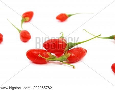 Ripe Fruit Of Goji Berry Or Wolfberry Isolated On White, Lycium Barbarum