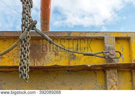 Heavy Lifting Steel Wire And Chains At Dumpster