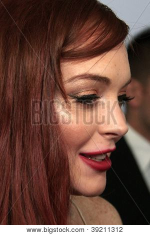 LOS ANGELES - NOV 20:  Lindsay Lohan arrives to the private dinner for the premiere of Lifetime's 'Liz & Dick'  at Beverly Hills Hotel on November 20, 2012 in Beverly Hills, CA