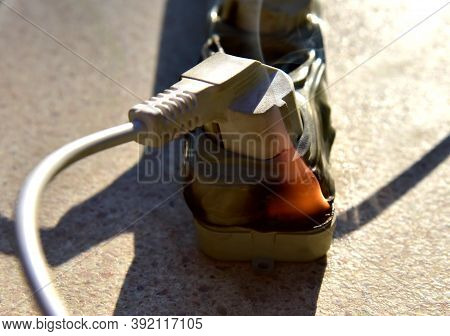 Outlets With Switche Caught Fire In Room. Overloaded Electrical Current Or Short In Device From Many