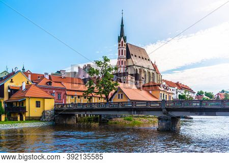 St Vitus Church In The Middle Of Historical City Centre. View From Vltava River. Cesky Krumlov, Sout