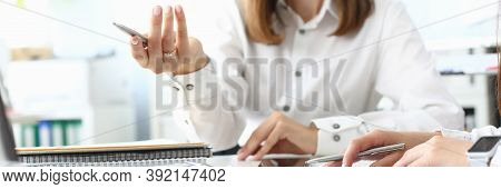 Focus On Smart Businesswoman Sitting Indoors And Holding Metallic Writing Pen. Witty Female Manager 