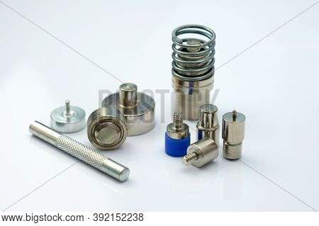 Matrices For Installing Metal Fittings On Garments. Equipment For The Installation Of Sewing Accesso
