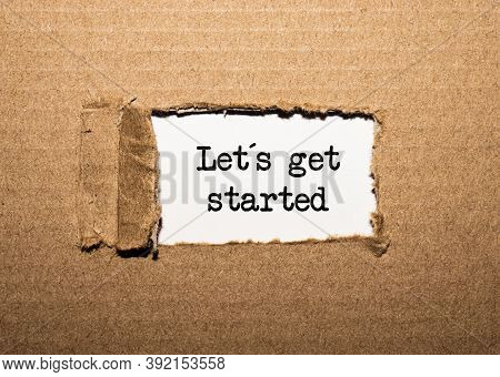 The Text Let's Get Started. Behind Torn Brown Paper