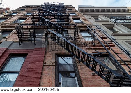 Building With Exterior Metal Staircase, Located In New York, Manhattan 222 E 51st, Usa, Typical Of M