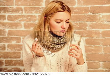 Pills For Breaking Fever. Take Medications To Reduce Fever. Headache And Fever Remedies. Woman Tousl