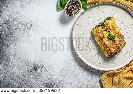 Cannelloni With Ricotta And Spinach. Italian Cuisine. Gray Background. Top View. Copy Space