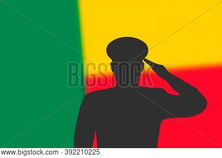 Solder Silhouette On Blur Background With Benin Flag.