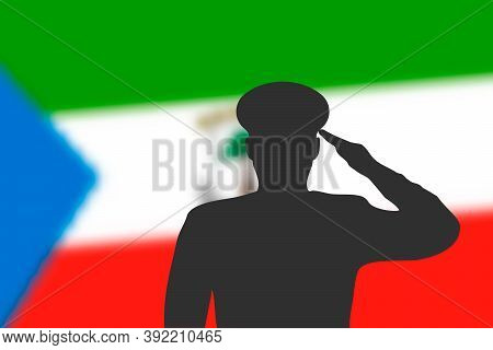 Solder Silhouette On Blur Background With Equatorial Guinea Flag