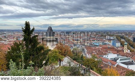 Grazer Uhrturm Landmark Of Graz, Capital City Of Styria In Austria. Panorama Picture Of The City .