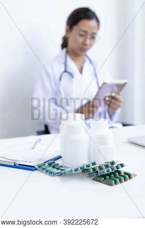 Closeup portrait, Scientists in white lab coats are analyzing the vital substance of the Blood vesse