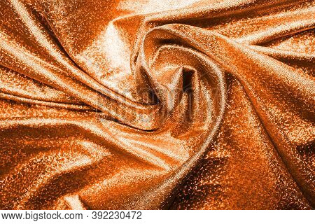 Orange Rippled Elegant Glitter Fabric For Background, Flatlay Top View