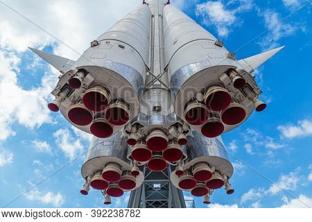 Rocket engine and red nozzle engines on the background of blue sky. Monument - rocket to launch spaceships. Russia, Moscow