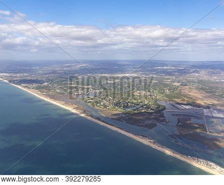 Aerial Of Faro With Harbor And Beach In Portugal