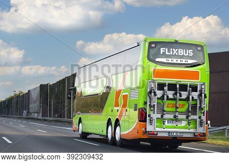 Bonn, Germany - 13 September 2020. Flixbus Tourist Coach Driving On A Highway In Germany, Empty Road