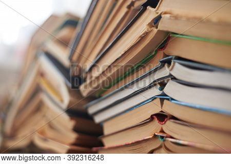 Old Books Piled Up In A Heap, Close-up, Selective Focus, Learning And Education Concept.