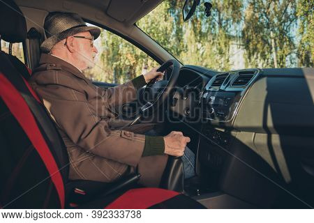 Photo Of Pensioner Grandfather Drive Sit Seat Hold Steering Wheel Shift Stick Wear Brown Coat Headwe