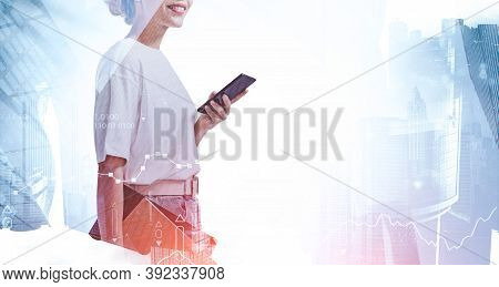 Unrecognizable Young Businesswoman Standing With Smartphone In Blurry City. Concept Of Corporate Lif