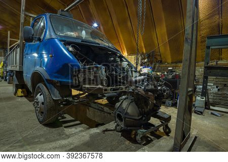 St. Petersburg, Russia - August 12, 2020: Crashed Gazelle Light Truck With A Removed Engine On A Car