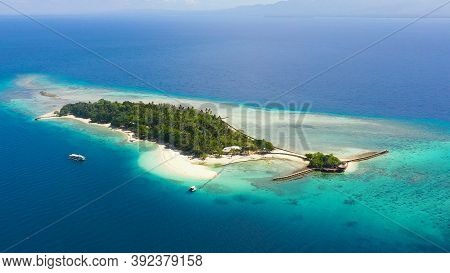 Aerial View Of Little Liguid Island With Sand Beach, Palm Trees By Atoll With Coral Reef. Little Cru