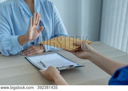 Government Officials Refused To Accept Bribes From The Businessmen Offer For Signing In A Contract O
