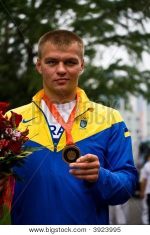 Vyacheslav Glazkov med olympiske Bronze medalje