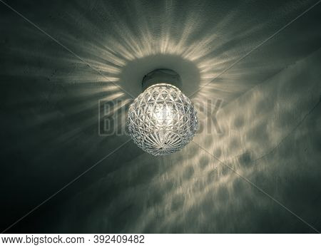 Old Vintage Luster Glass Globe With A Light Bulb.