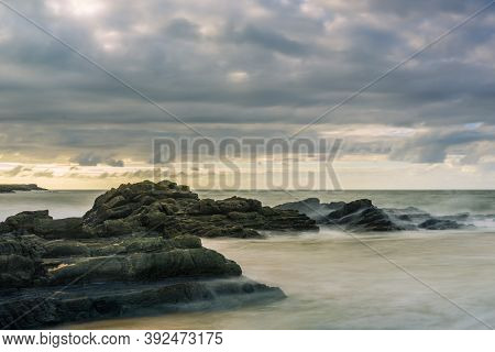 Serantes Beach Landscape With Rocks And Sea Water In Asturias, Spain
