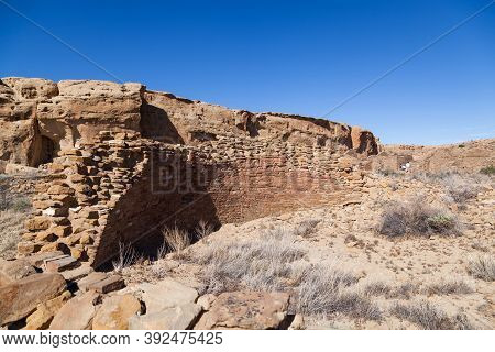 An Ancient Rock Wall Of The Chetro Cetl Great House Is Slowly Eroding Over Time As Unrecognizable To