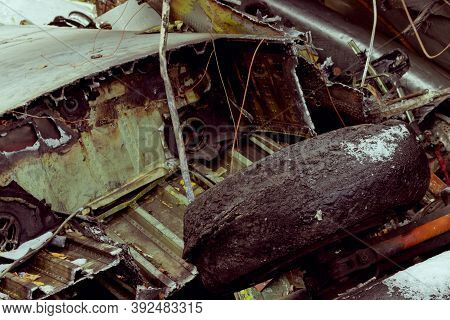 Plane Wreckage, Parts Of The Fuselage And Wing Of The Burned And Broken Aircraft At The Landfill Of 