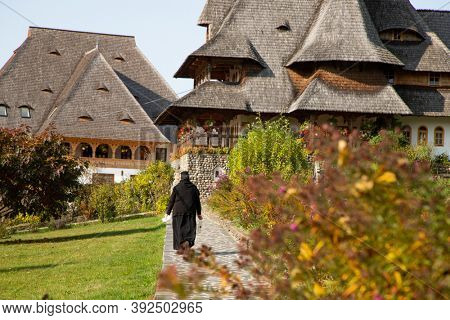 BARSANA, ROMANIA - OCTOBER 28, 2020: View of Barsana Wooden Monastery site in Maramures County, Romania.