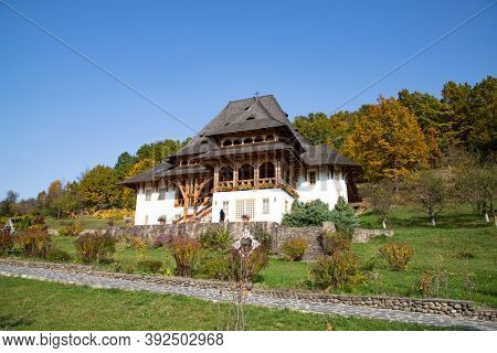BARSANA, ROMANIA - OCTOBER 28, 2020: View of Barsana Wooden Monastery site in Maramures County, Romania.