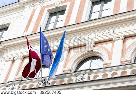Riga, Latvia - September, 2019: Latvian Flag On Riga City Council (rigas Dome) Building Of The Gover