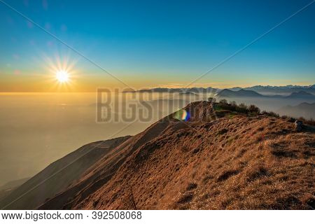 Winter Sunset From An Alpine Peak Of Friuli-venezia Giulia