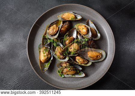 Classic French Meal Moules Marinière  Marinara Mussels With Garlic, Sauce, Lemon And Parsley.