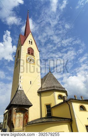 Historic Belfry Of Church In Monguelfo, Pusteria Valley, Bolzano, Trentino Alto Adige, Italy