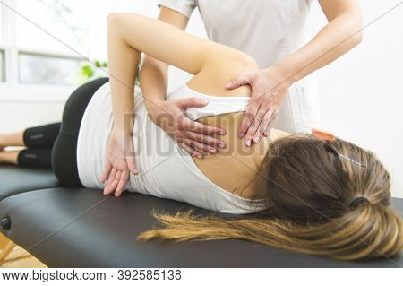 A Modern Rehabilitation Physiotherapist At Work With Client