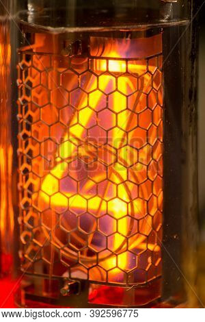 4, Nixie Tube Showing Four Red, Macro Shot