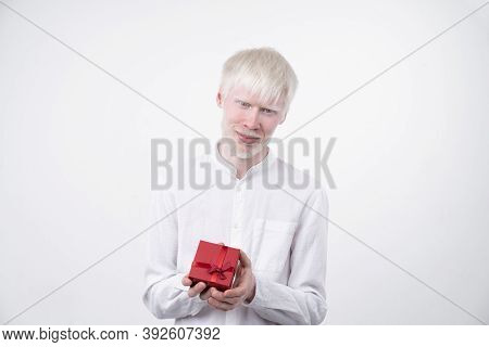 Albinism Albino Man In Studio Dressed T-shirt Isolated On A White Background. Abnormal Deviations. U