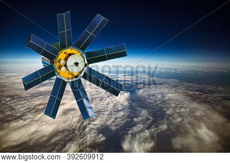 Space satellite orbiting the earth. Elements of this image furnished by NASA.