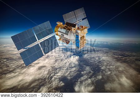 Space satellite orbiting the earth. Elements of this image furnished by NASA.