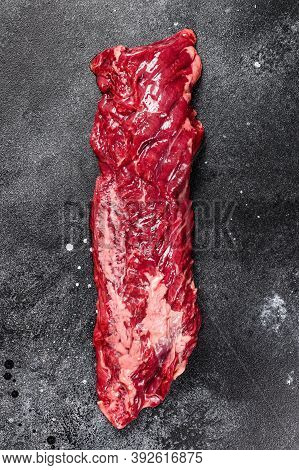 Raw Top Blade, Denver Steak. Black Background. Top View.
