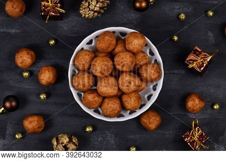 Traditional German Christmas Sweets Called 'marzipankartoffeln'. Round Ball Shaped Almond Paste Piec