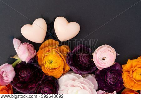 Buds Of Valentines Day Festive Flowers With Two Hearts On Minimal Black Background