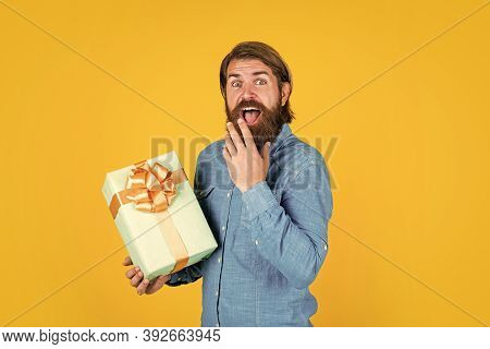 Making Purchases At Store. Buy Anniversary Gifts. Surprised Male Open Box With Something Exciting In