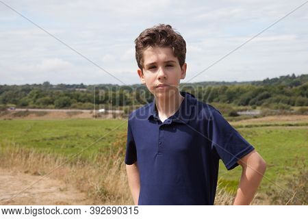 A Portrait Of A Young Teenage Boy With The Dorset Countryside Behind Him, Taken On The 23rd July 202