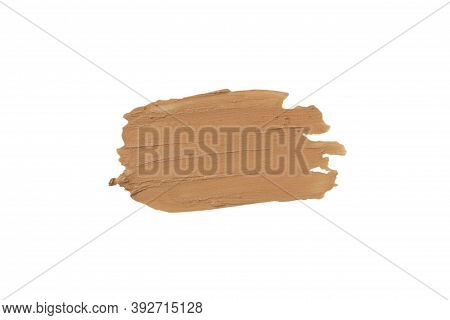 Brown, Beige Isolated Swatch Of Lipstick On A White Background. A Smear Of Makeup. The Base For Make
