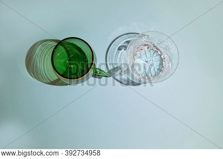 Two Empty Crystal Cups Stand Next To Each Other The View From The Top